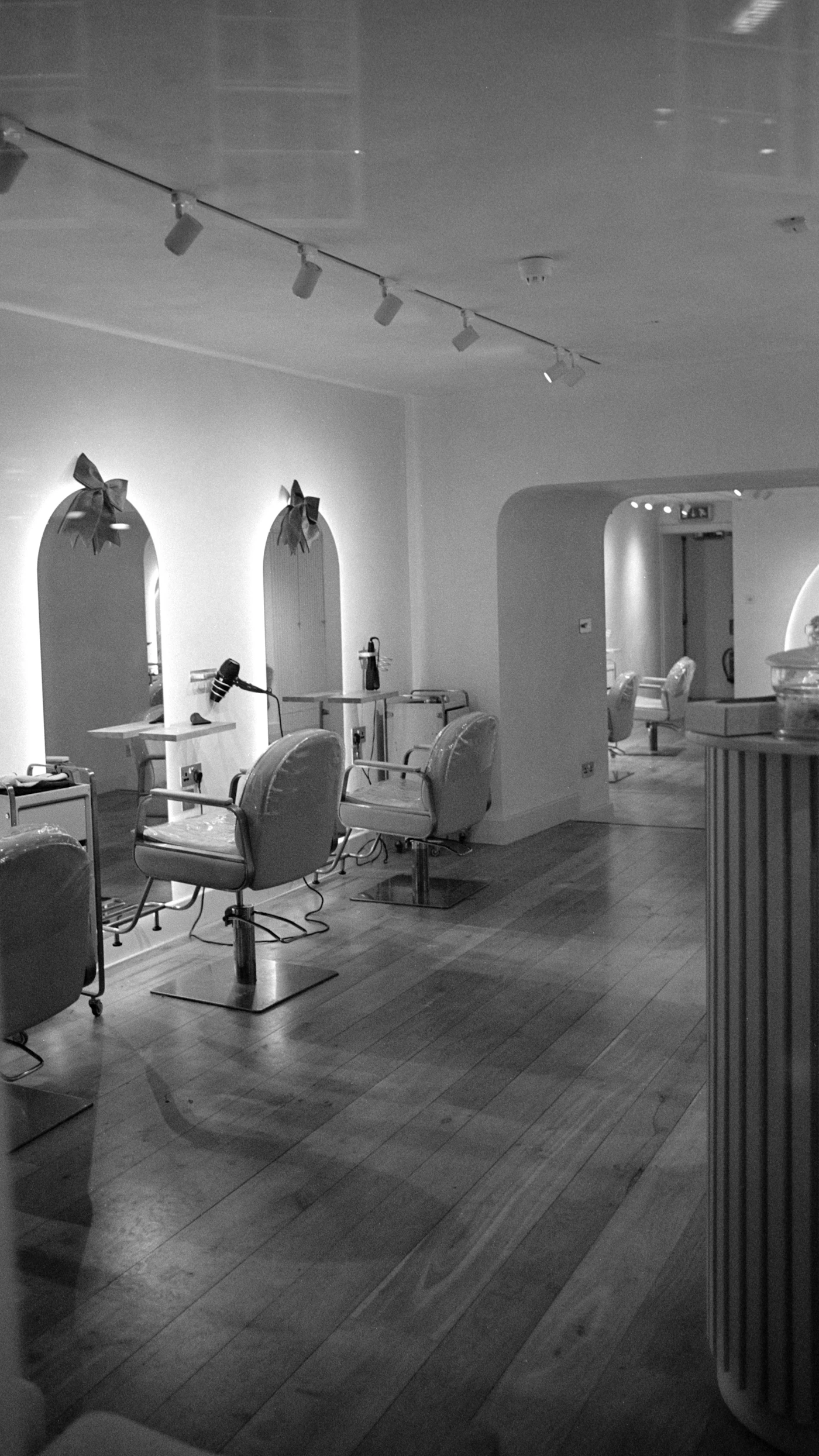 Styling chairs and mirrors in a salon interior